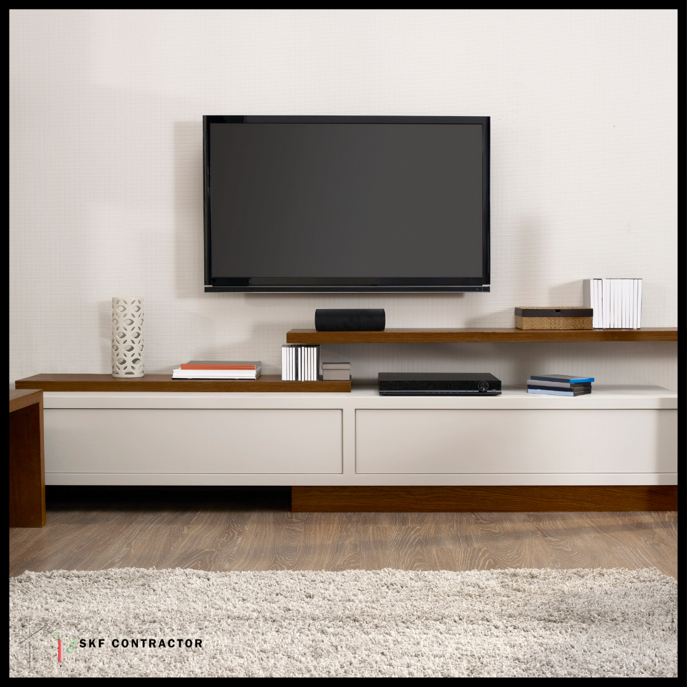 Modern low-height TV unit with white drawers, walnut wood shelf and wall-mounted TV.