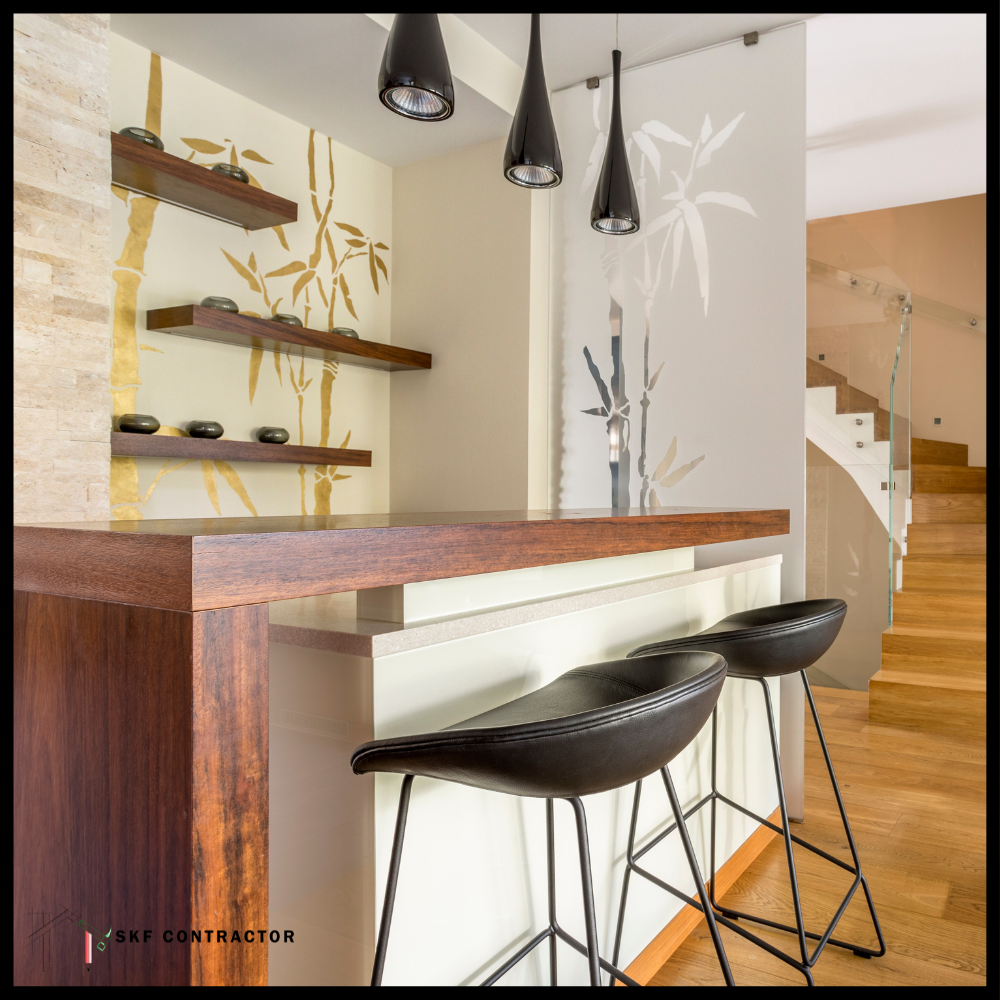 Asian-style walnut bar counter, black saddle stools, floating shelves, gold bamboo mural, cone pendants.